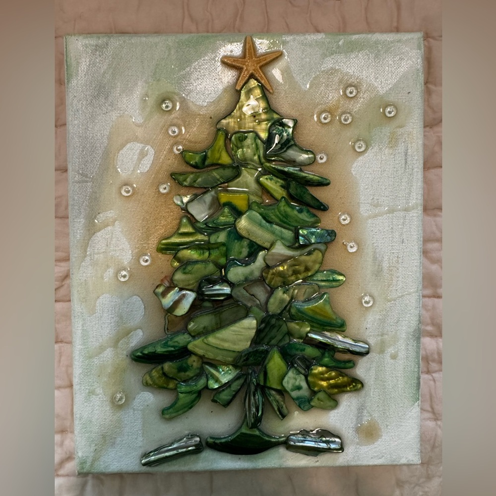 Christmas tree in sea glass and shells in tones of green. Very Christmasy!